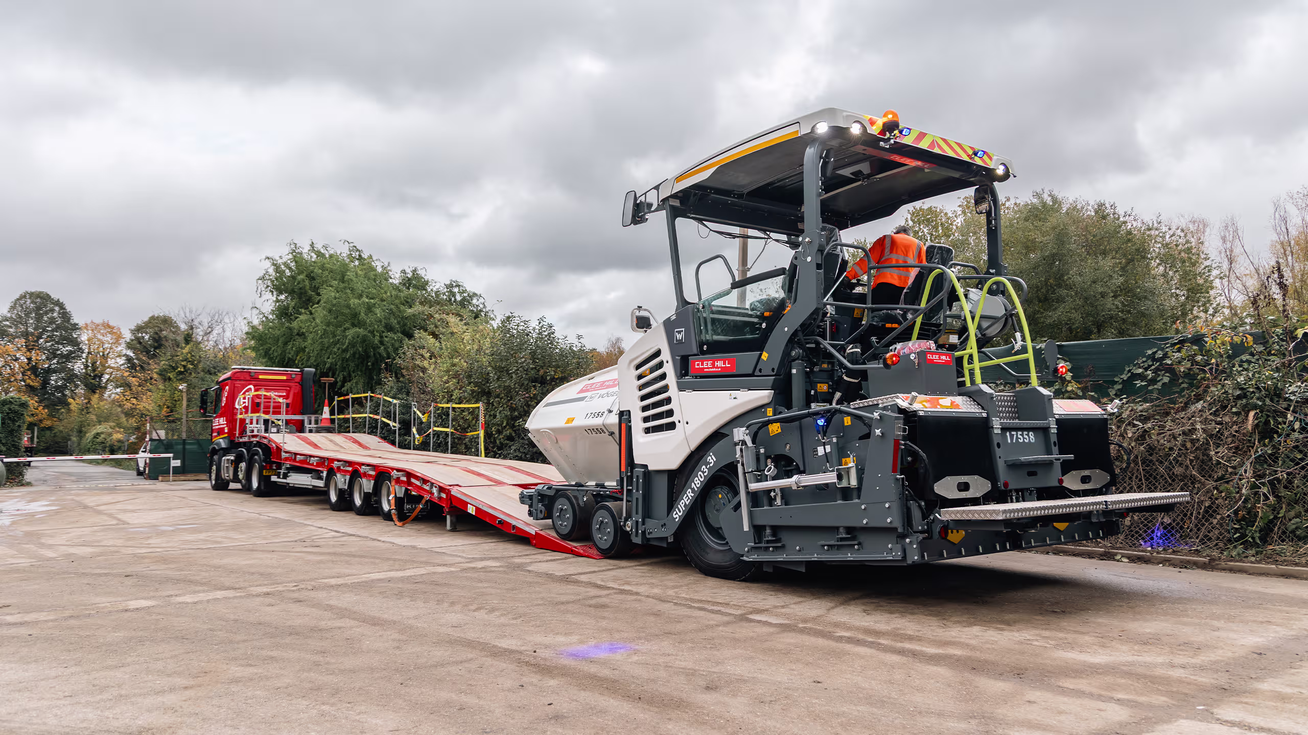 King GTSS44 semi-sloper trailer transporting low ground clearance plant machinery.