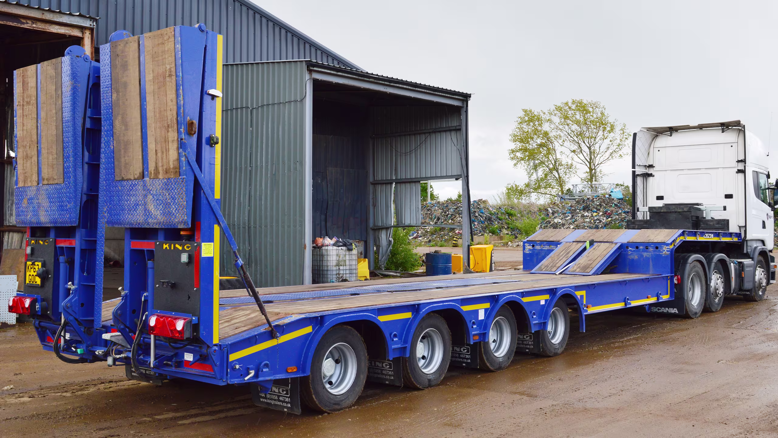 King GTS73/4-19.5 stepframe low loader trailer and hydraulic flip-toe ramps, designed for STGO Category 2 operations.