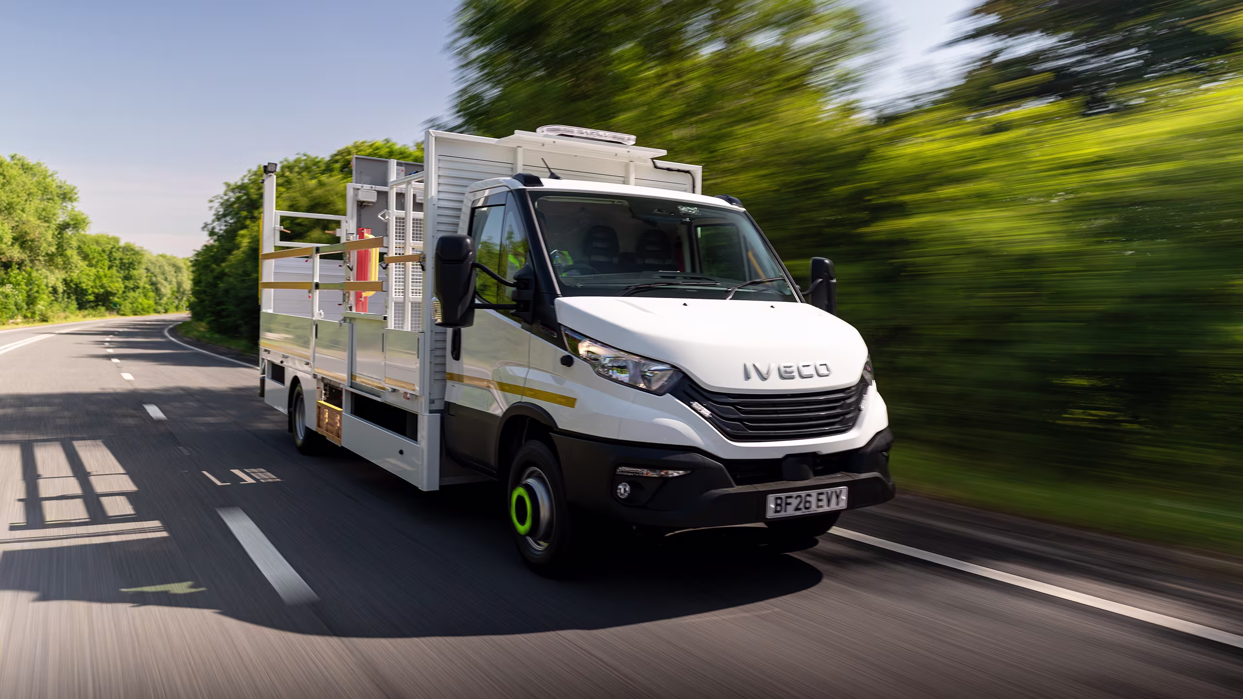 King Iveco 7.2T Traffic Management Vehicle driving on a highway, showcasing traffic management equipment and safety features.