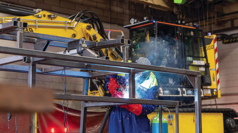 King Trailers manufacturing process and welding of trailer components.